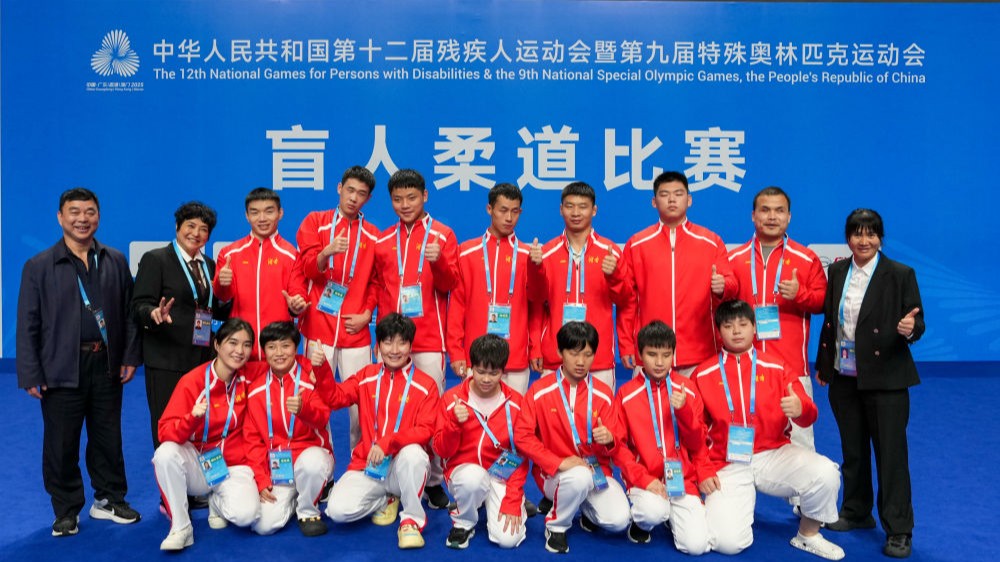 图片故事：“妈妈教练”李跃华