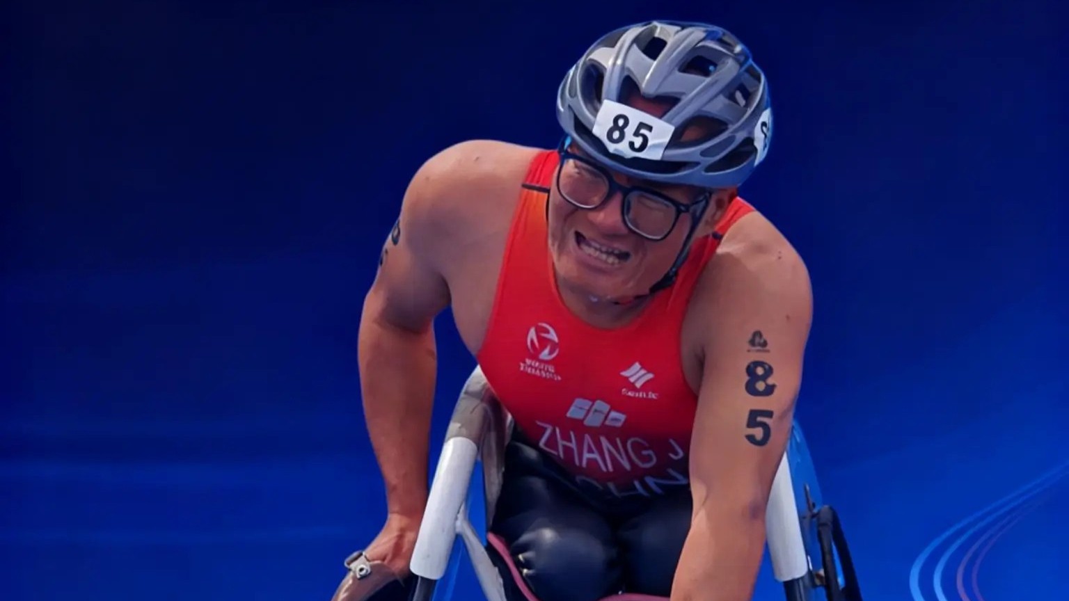 张健：轮椅上的“铁三”勇士